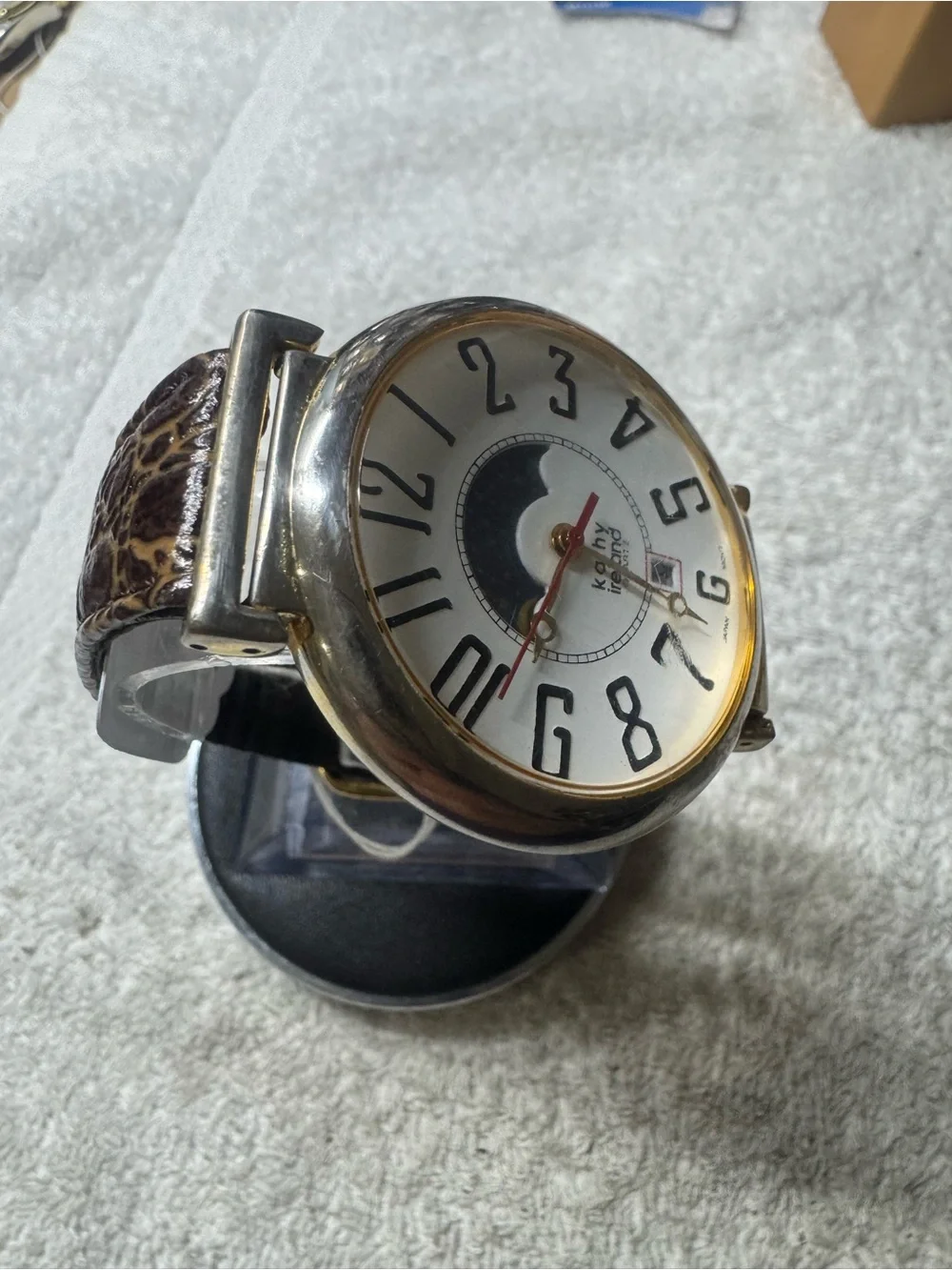 kathy ireland White Dial Moonphase Watch with Gold Accents and Red Second Hand